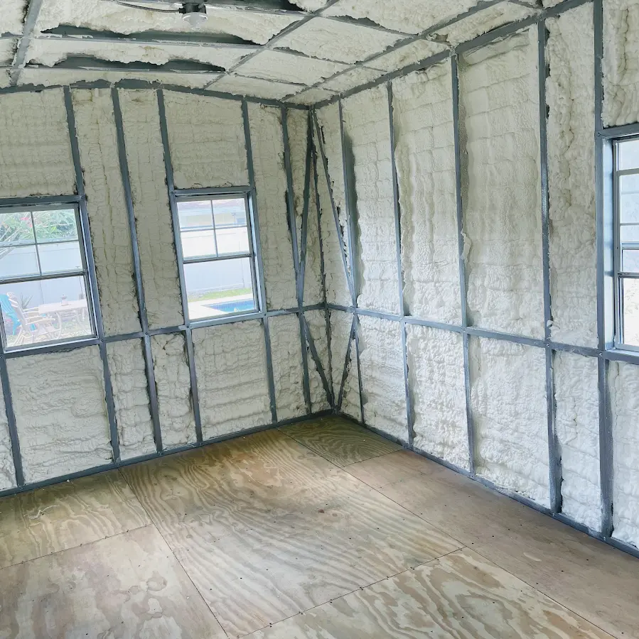 Closed-cell spray foam insulation applied to wall cavities in a residential project in Swanzey